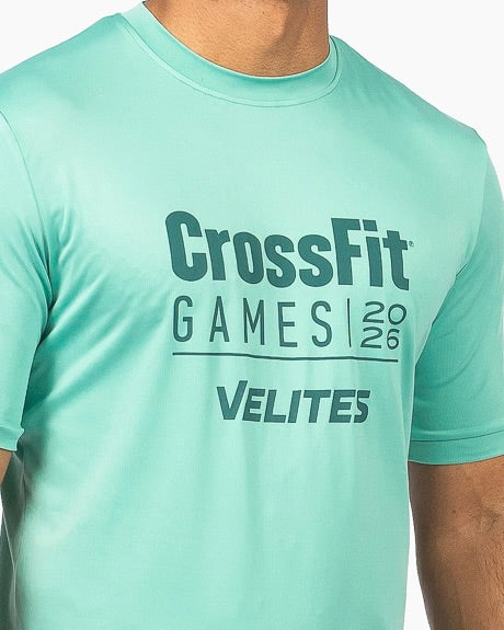 Close-up of the textured logo print on the breathable green fabric of the Velites t-shirt